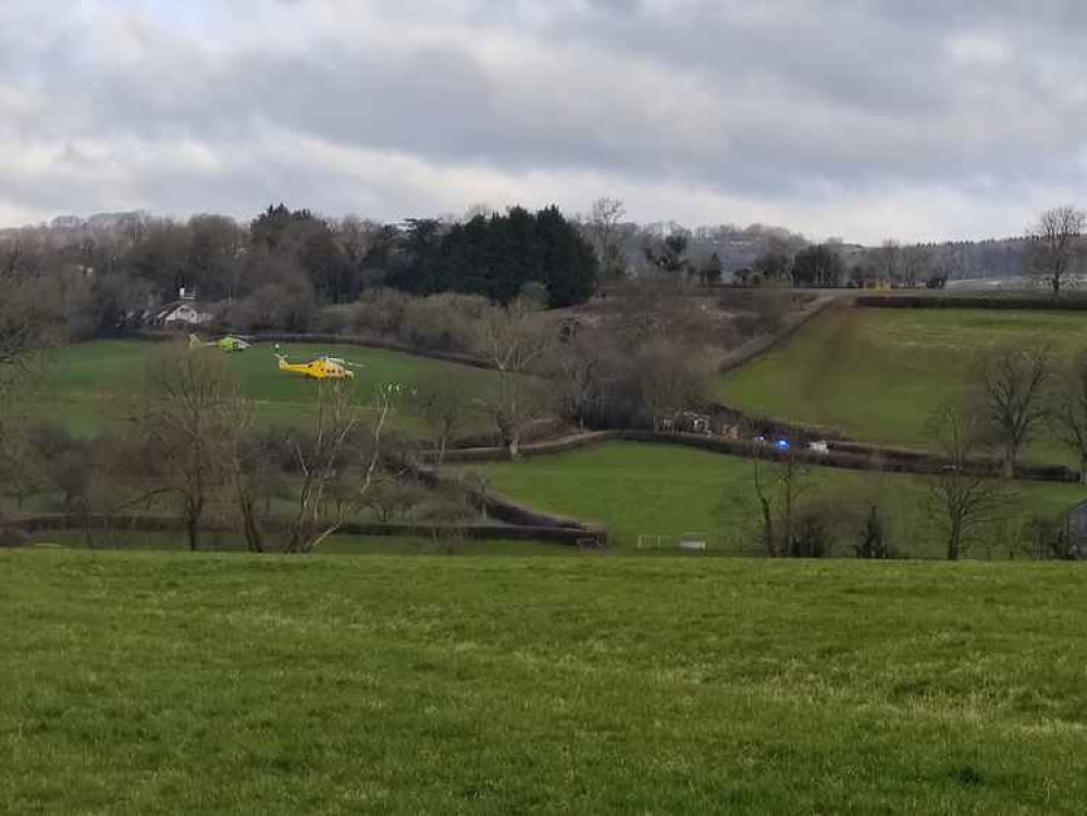 Helicopters and emergency services at the scene of the crash