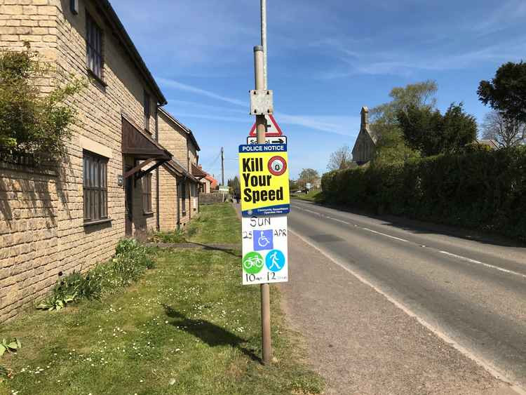 A sign advertising the event along the route, on the A39 in Coxley