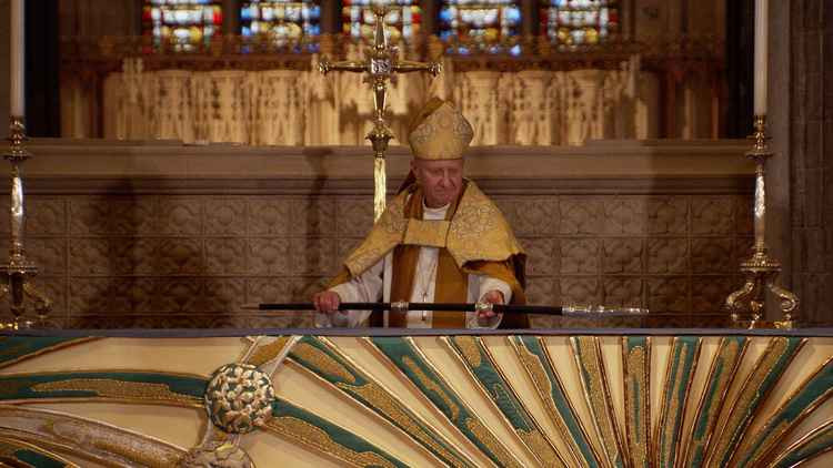 Bishop Peter laying down his crozier