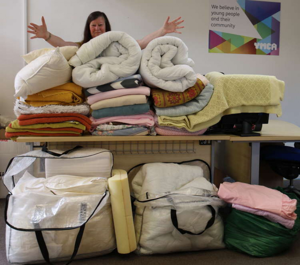 Carol bags of bedding donation in Wells Local News News