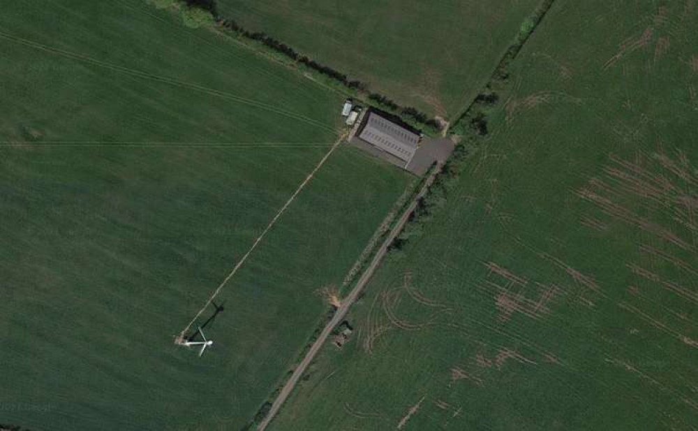 Looking down towards the wind turbine and a barn at Beechbarrow (Photo: Google Maps)