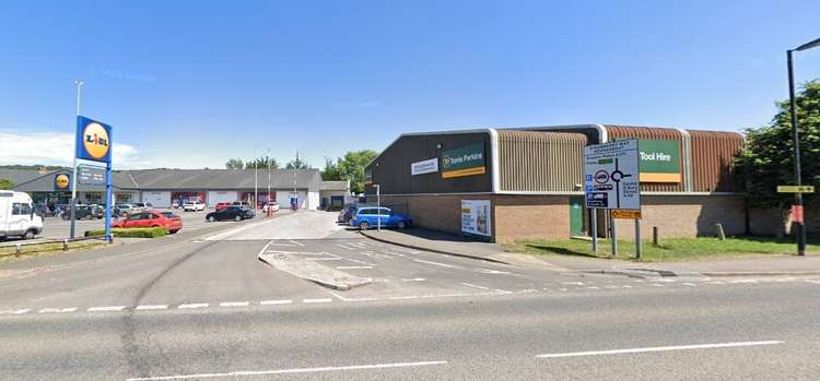 The existing Lidl store and former Travis Perkins outlet on the A39 Strawberry Way in Wells (Photo: Google Maps)