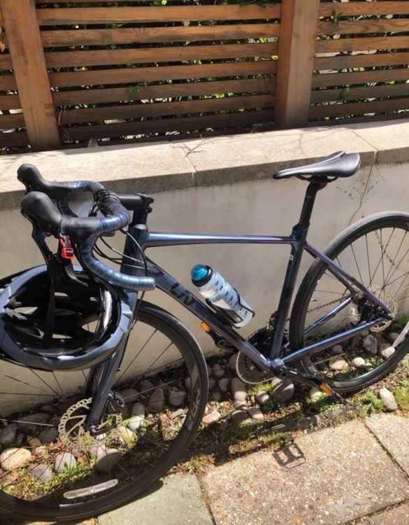 The bike is iridescent blue in colour.