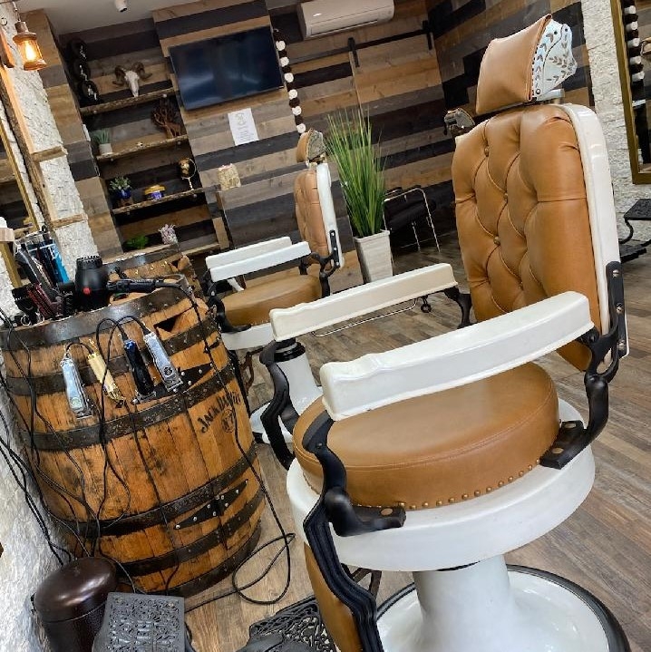 What sets the Bryant Park Barber Brotherhood apart from other barbershops in terms of customer experience?