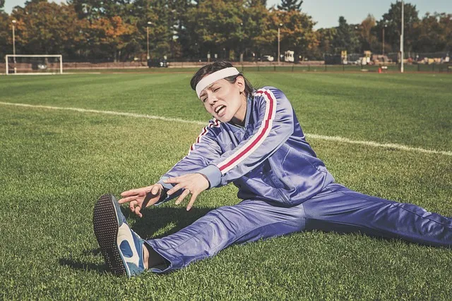 [Image of an athlete stretching after a workout]