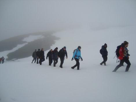 Hiking the snowy hills of Jan Mayen