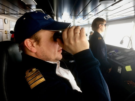 HDS05-19, DAY 04, meike captain watching for bear in the ice - Oceanwide Expeditions.jpg