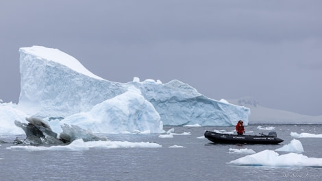 HDS26-24, Day 14, Zodiac and iceberg © Sara Jenner - Oceanwide Expeditions.jpg