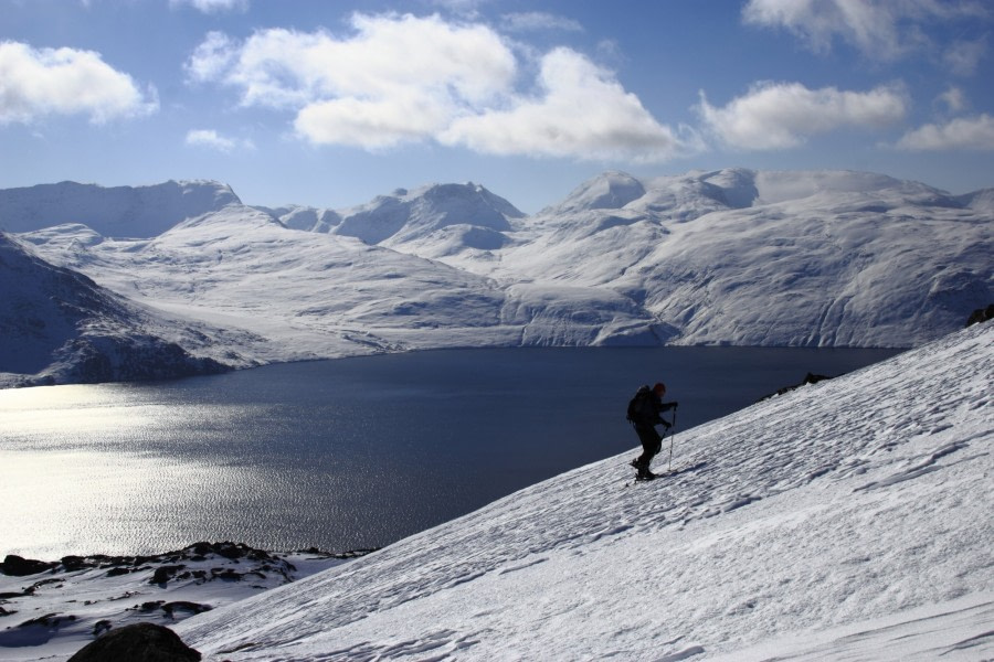 Skiing from the snow capped  mountains