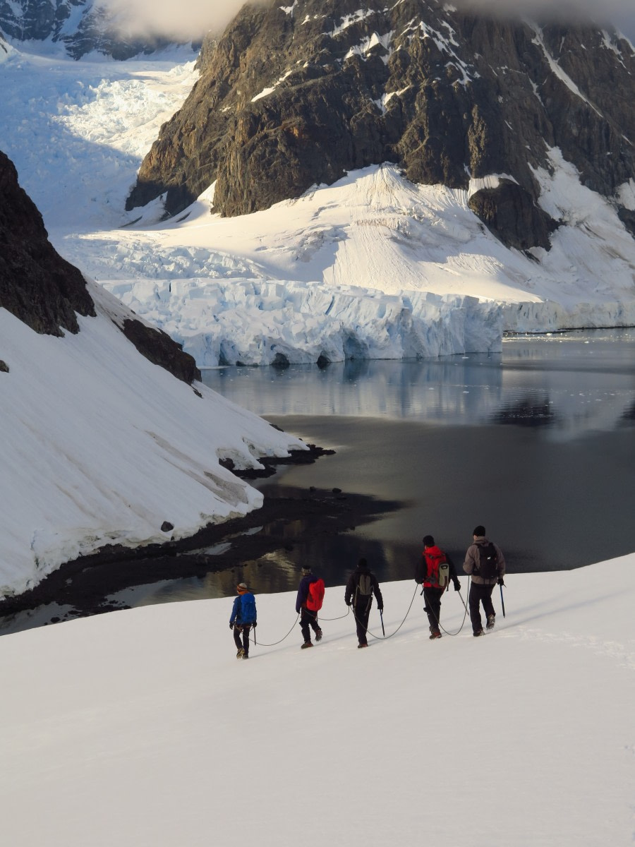 PLA30-17_11th Alimante Brown 01 - Heading towards the col MAL HASKINS-Oceanwide Expeditions.JPG