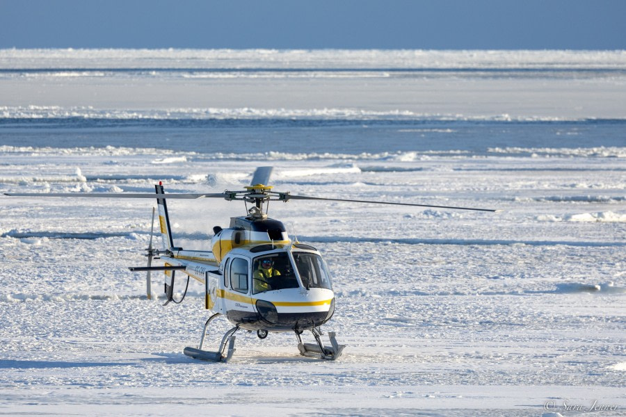 OTL28-23, Day 13, Dry Valleys - heli on the ice © Sara Jenner - Oceanwide Expeditions.jpg