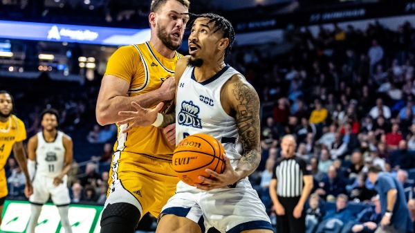 Norfolk,Virginia 20230222- Old Dominion Monarchs guard Mekhi Long (0) battles Southern Miss Golden Eagles forward Felipe Haase (22) on the way to the basket in tonight's men's Sun Belt basketball matchup between the Southern Miss Golden Eagles @ Old Dominion Monarchs at Chartway Arena in Norfolk,Virginia. The Monarchs upset the Eagles 69-54 raising their record to 18-11, 10-7 in conference. They now host the Thundering Herd of Marshall on Friday night for Senior Night.