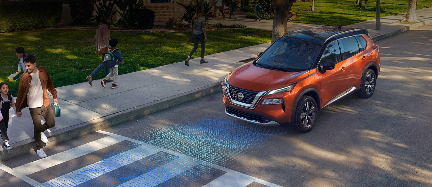 2022 Nissan Rogue stopped at a crosswalk illustrating safety shield 360.