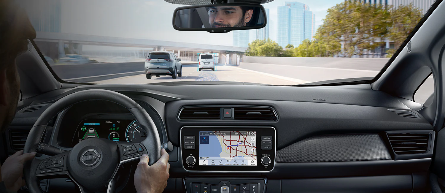 Interior of a Nissan LEAF Driving down the road