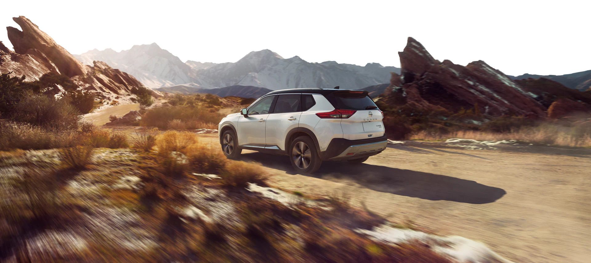 2024 Nissan Rogue crossover SUV in white and black