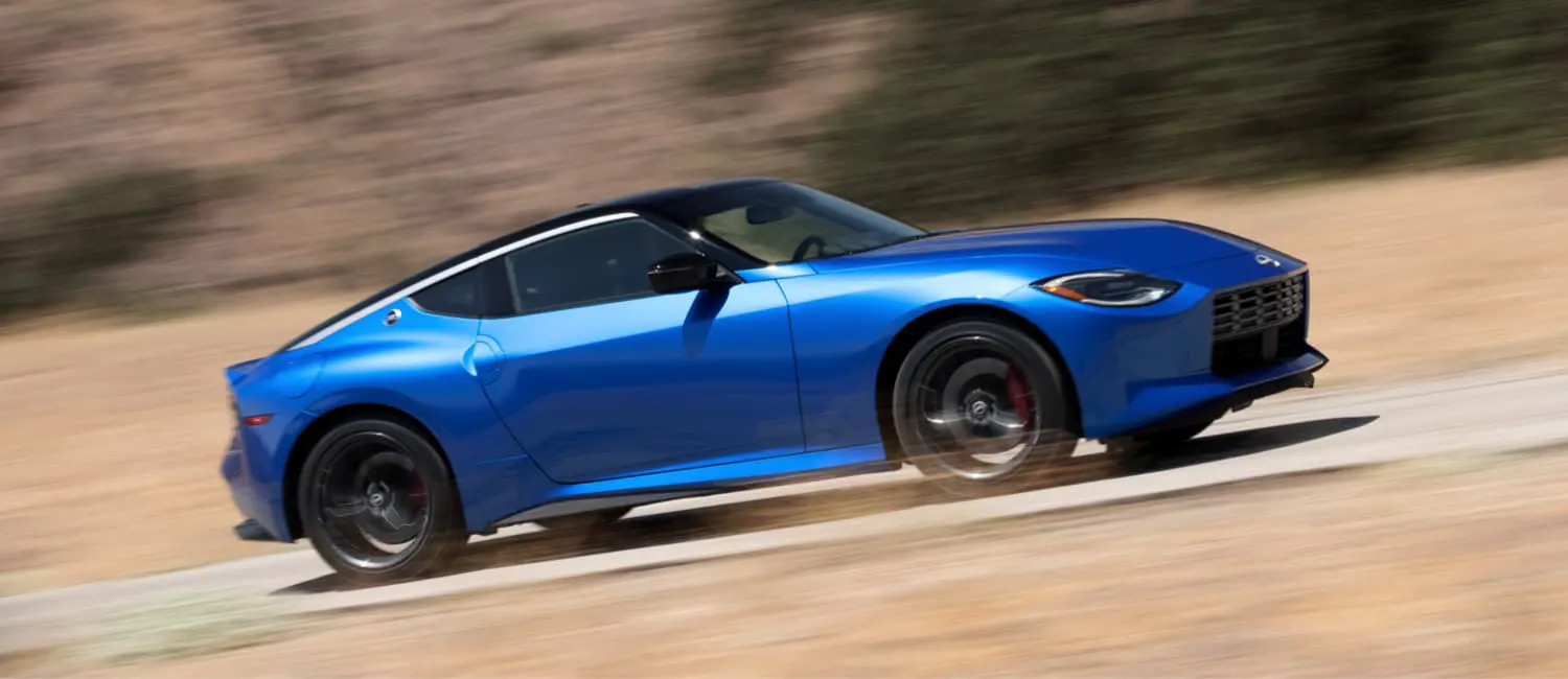 2024 Nissan Z At Speed In The Country Illustrating Suspension And Steering