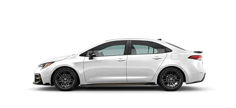 Driver side view of white Corolla SE Apex Edition