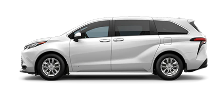 Driver side view of white Sienna LE