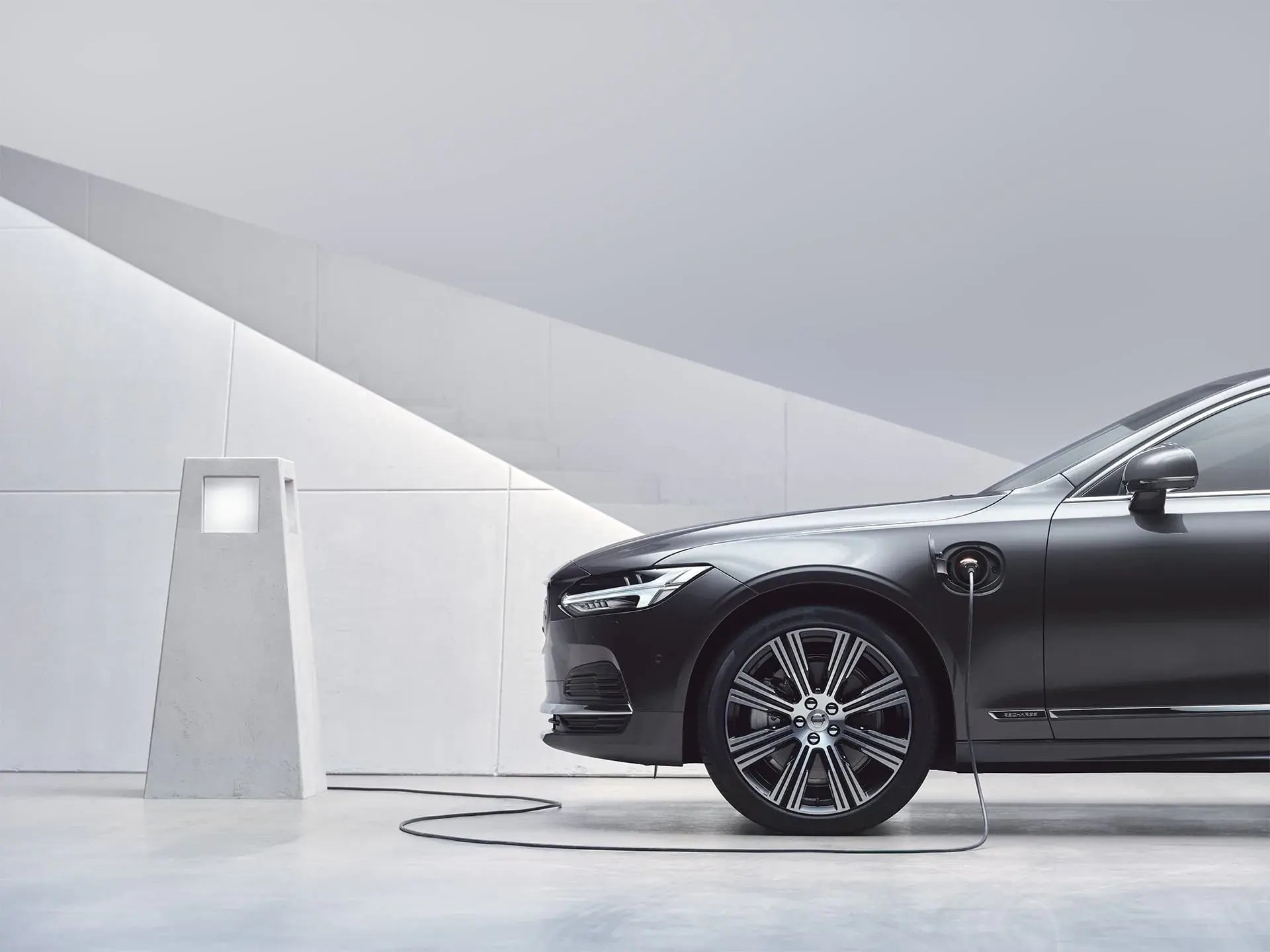 A dark gray Volvo S90