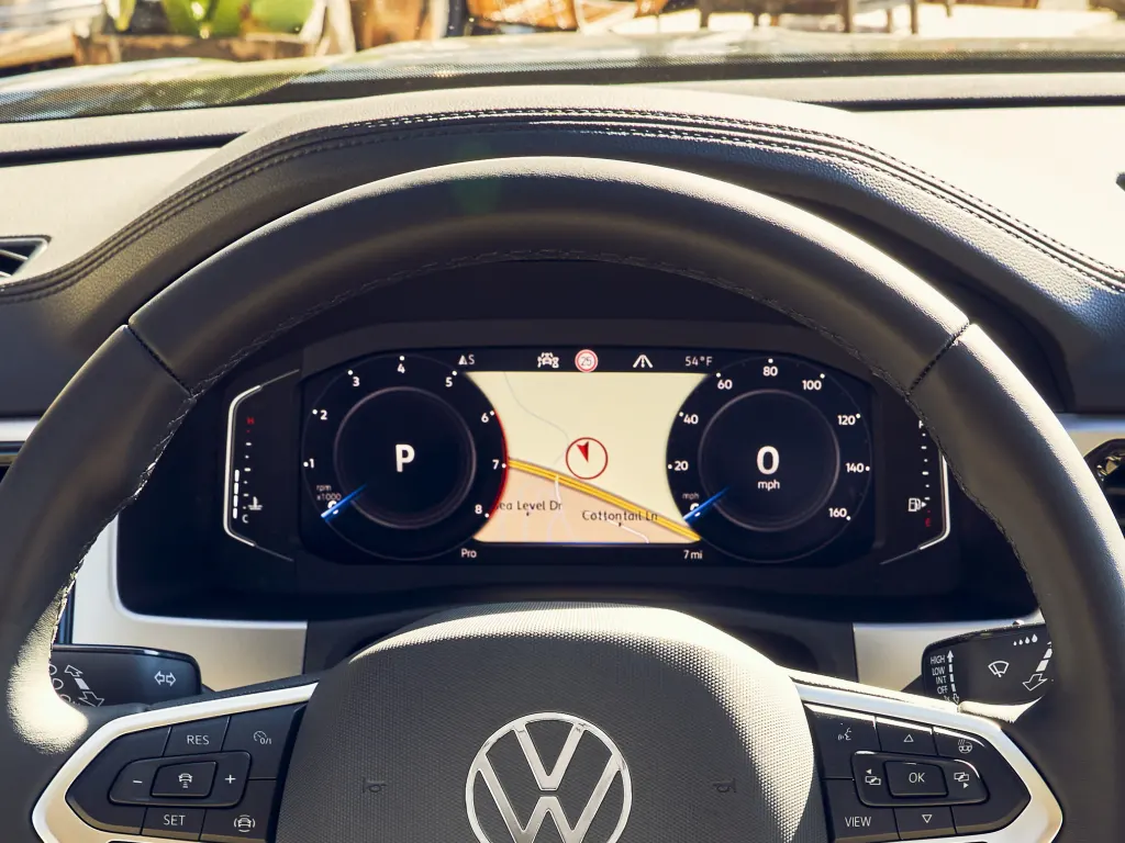 Closeup view of VW steering wheel and digital dashboard