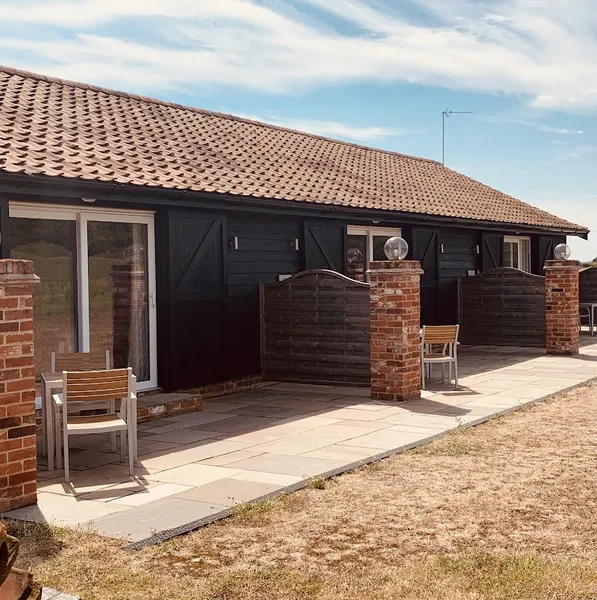 Plumptons farm holiday lodges secure private dog field in Tendring, CO7 8AZ