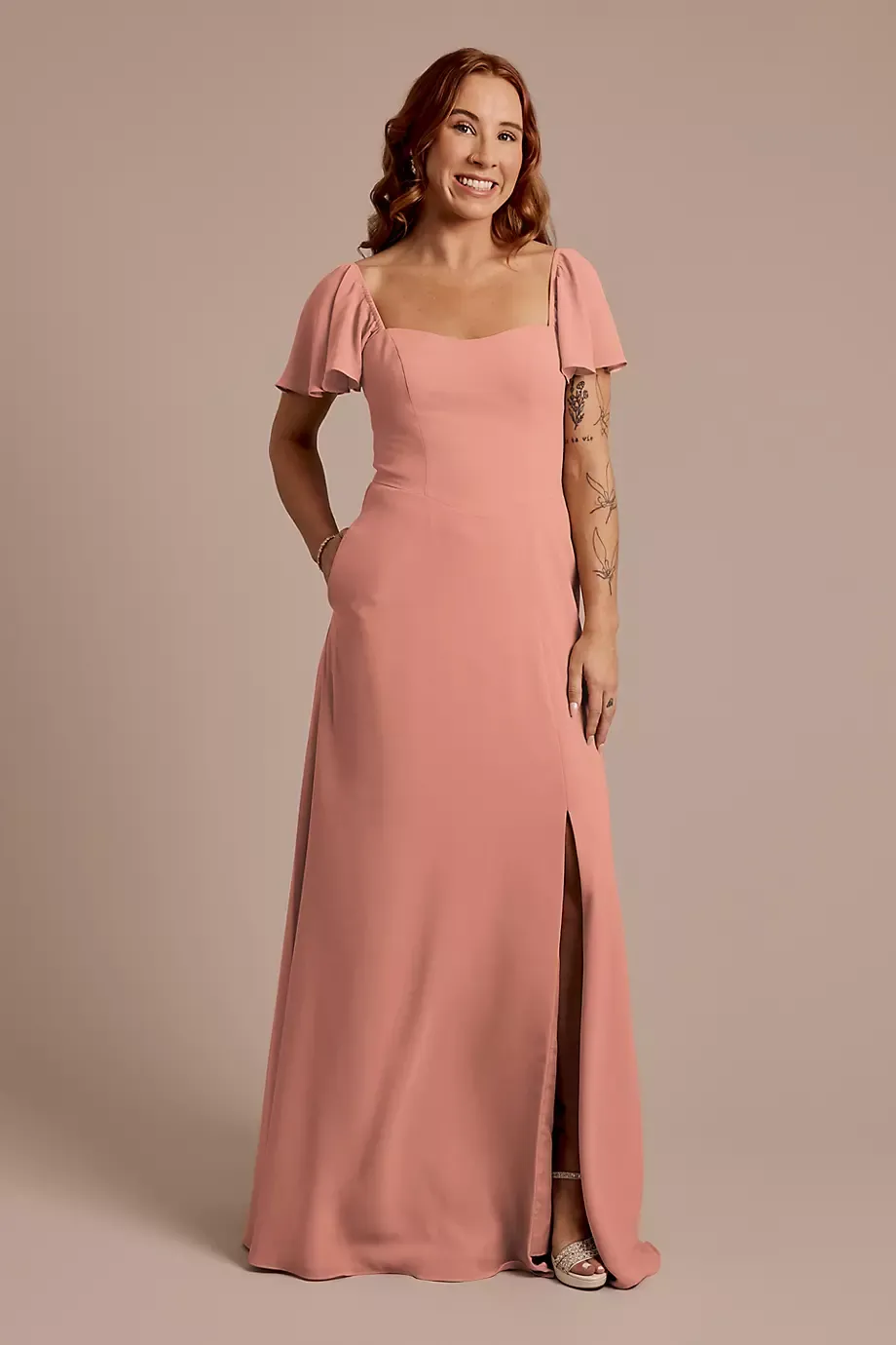 Celebrate DB Studio Chiffon Flutter Sleeve Dress With Basque Waist in Desert Coral Size: 26 David's Bridal