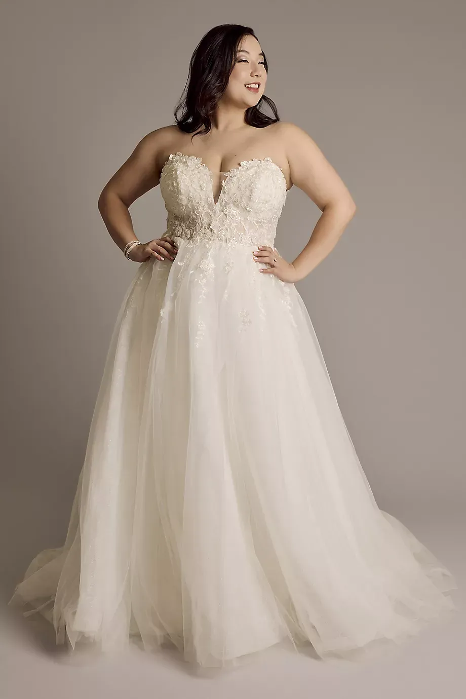 Oleg Cassini 3D Floral Plunging Strapless Tulle Ball Gown in Solid Ivory Size: 18W David's Bridal