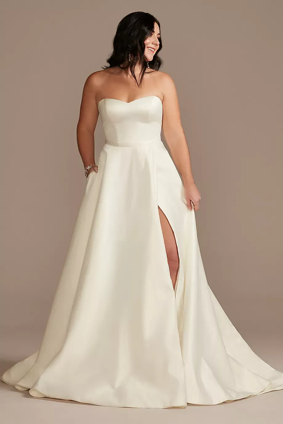 As Is Strapless Wedding Dress With Skirt Slit in Ivory Size: 8 David's Bridal