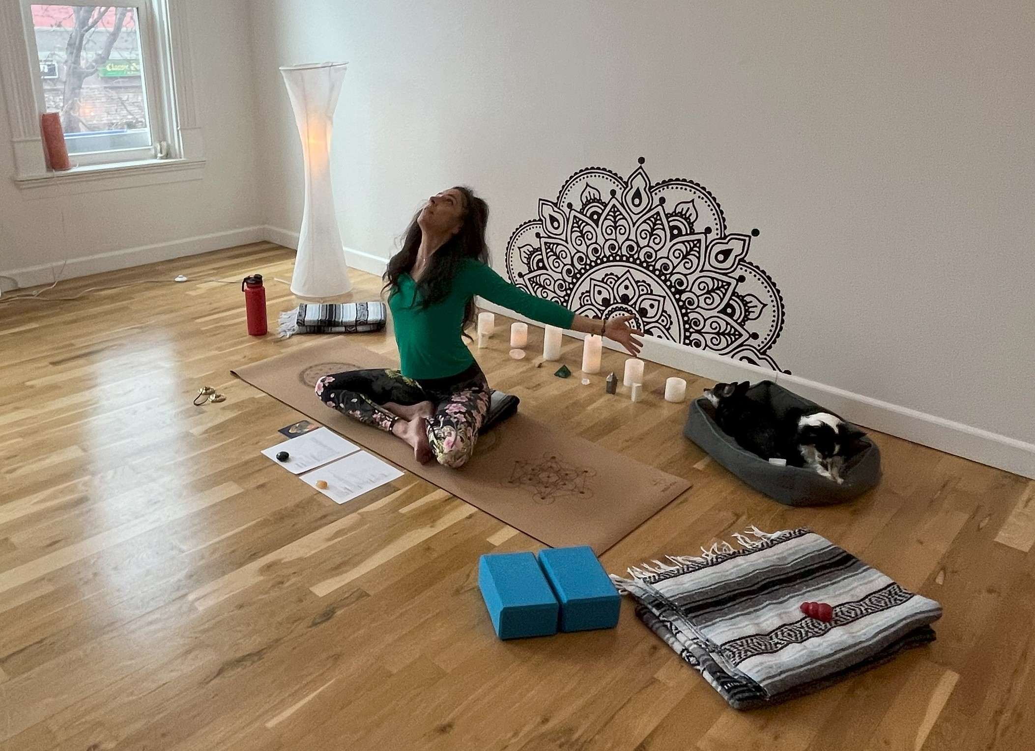 Milena hosting an online event doing robin's breath pranayama