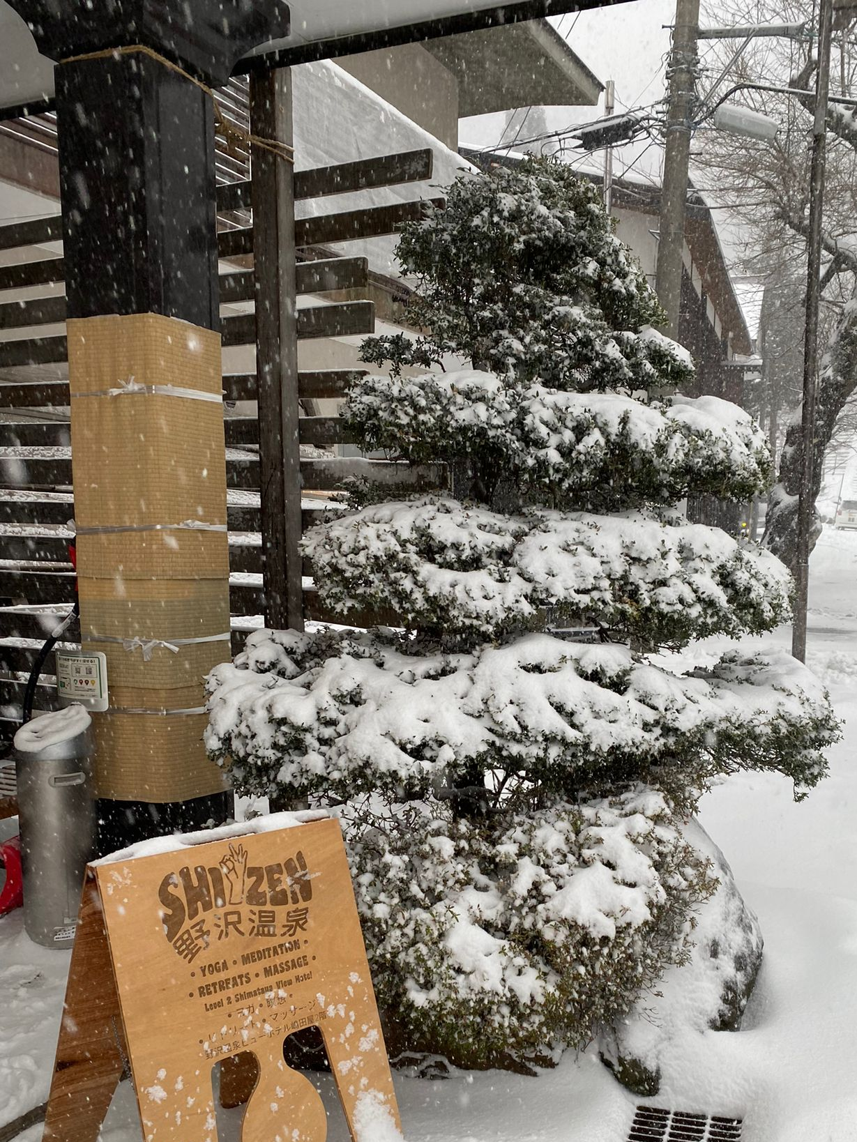 shizen yoga sign in the snow