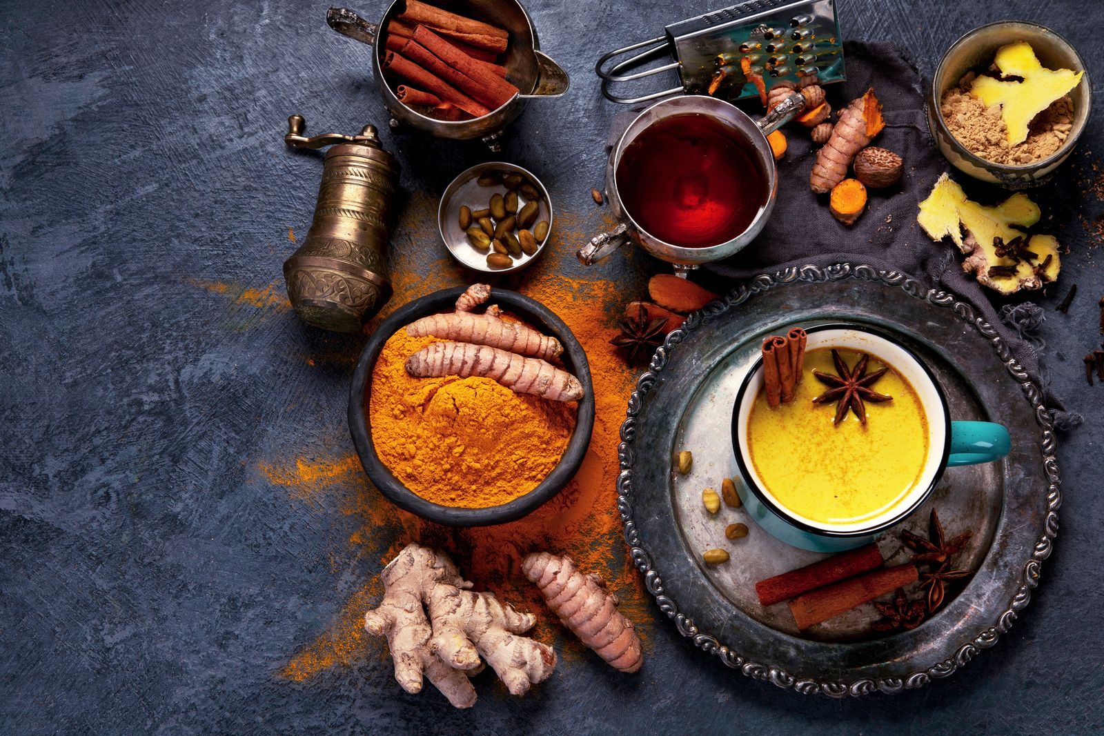 herbs used in ayurveda cooking for self care and balanced health: tumeric,curcumin,golden milk, star anise, ginger,cinnamon