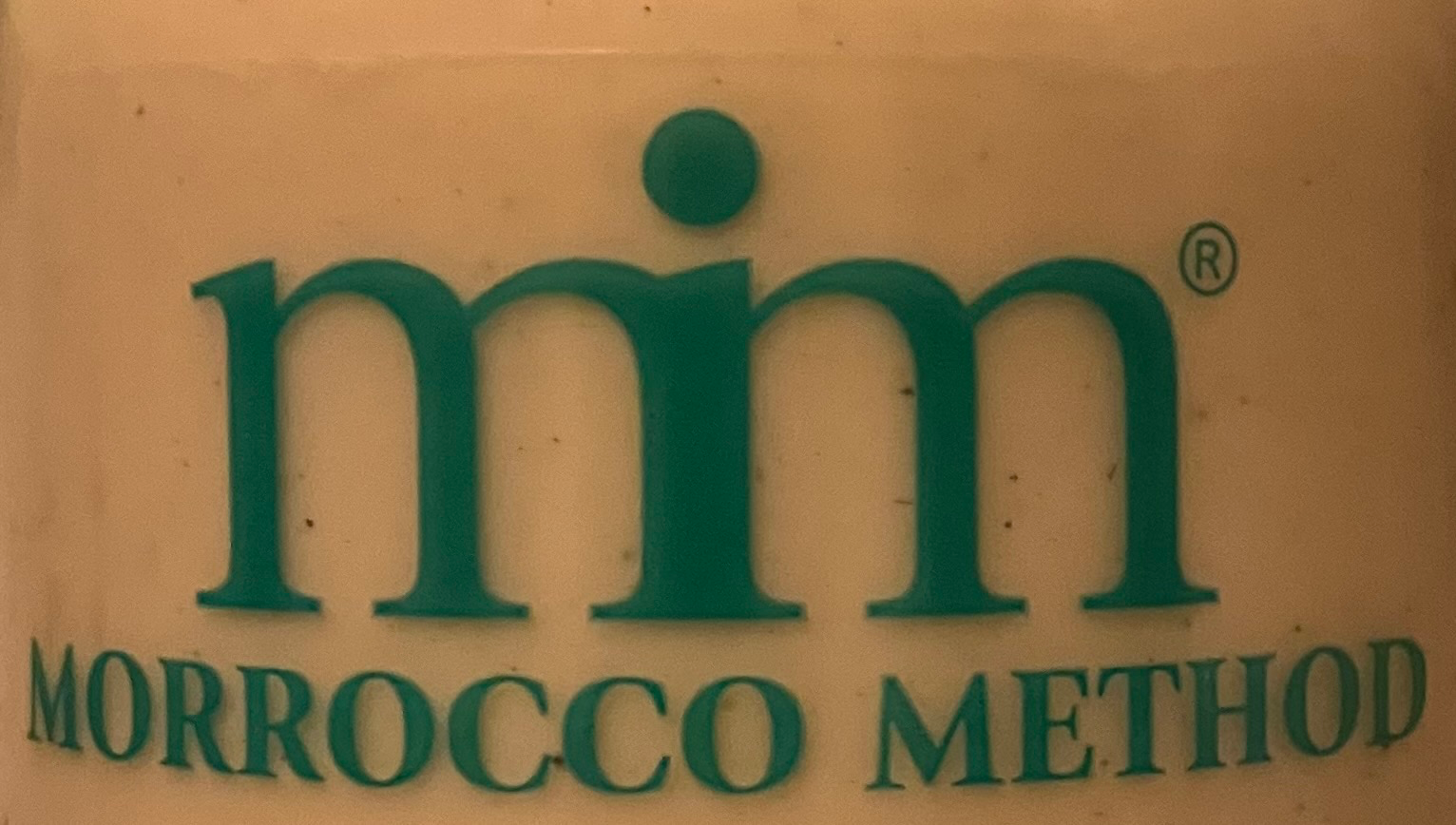 cropped photo taken by Monique Dupré, creator of tools for transformation focusing on stress management,  of Morrocco Method hair conditioner 