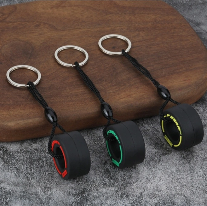 01 Pcs F1 Racing Car Rubber Tire Keychain Key ring Gift Mini Souvenir Gift(Made in China) 3