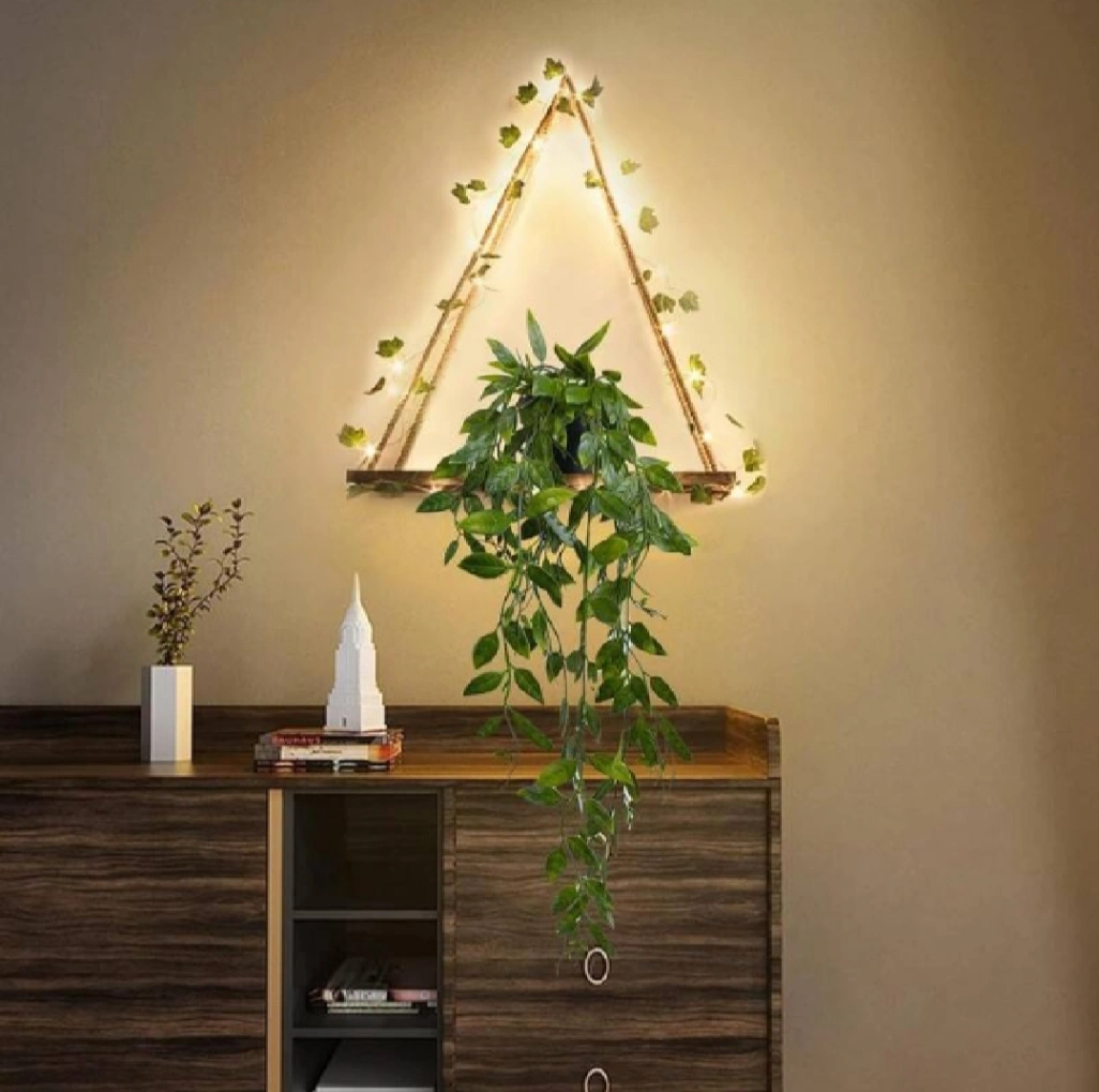 wall hanging shelve with artificial creeper and 2 m fairy light. 2