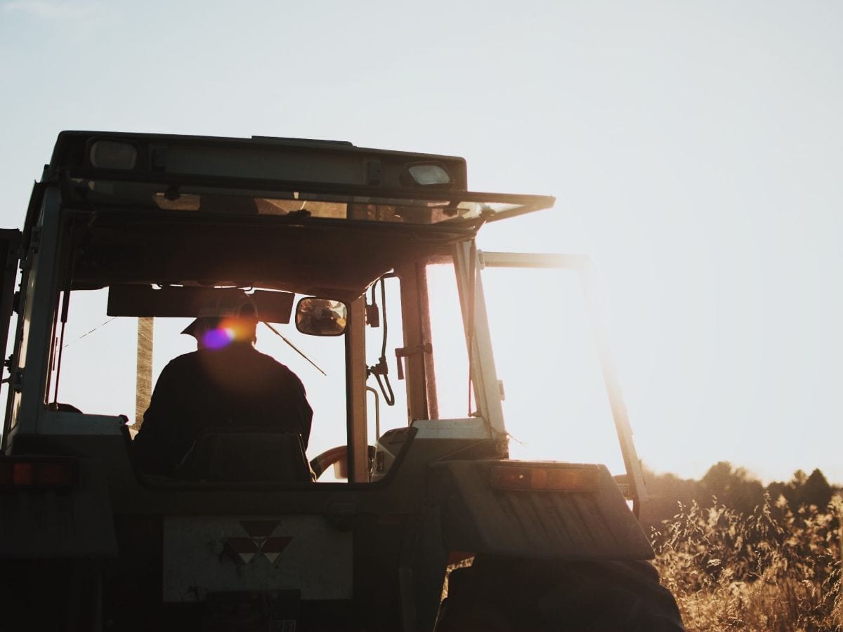 Offloadit | Offload surplus materials | Farmer on Tractor Image