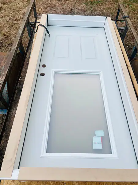 Traditions Collection exterior steel door manufactured by Therma-Tru and distributed by Reeb Millwork Corporation for Builders FirstSource. 