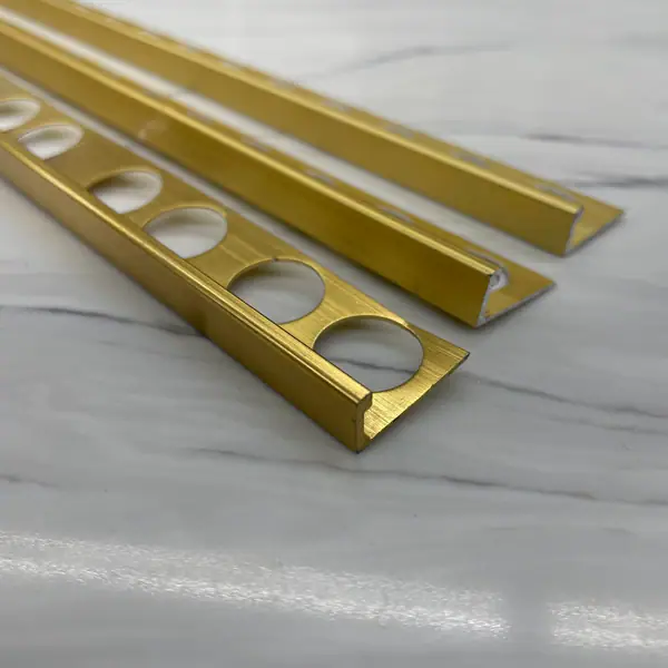 National Metal Shapes 10024 BR 5/16" Aluminum Trim Profile - Gold / Bright Brass