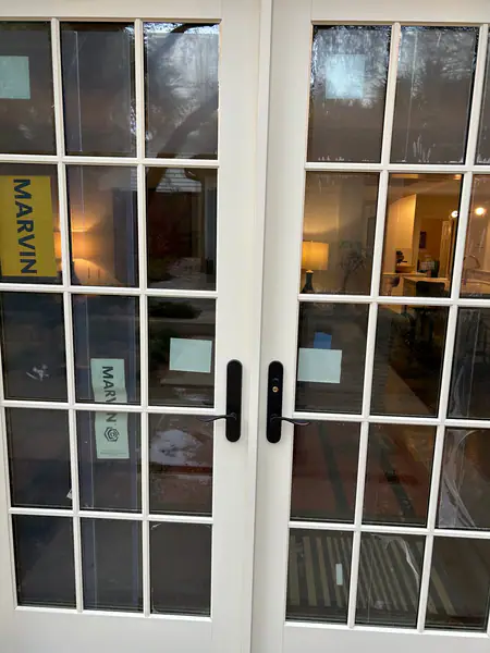 Marvin 6’0x7’0 open in patio swing doors, clad/wood, simulated divided lite.