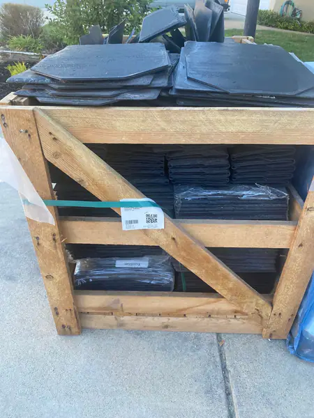 NEW: Majestic  Rubber Roof Shingles- covers 10x10 or 10x12 roof. Already crated and ready for pick up. 