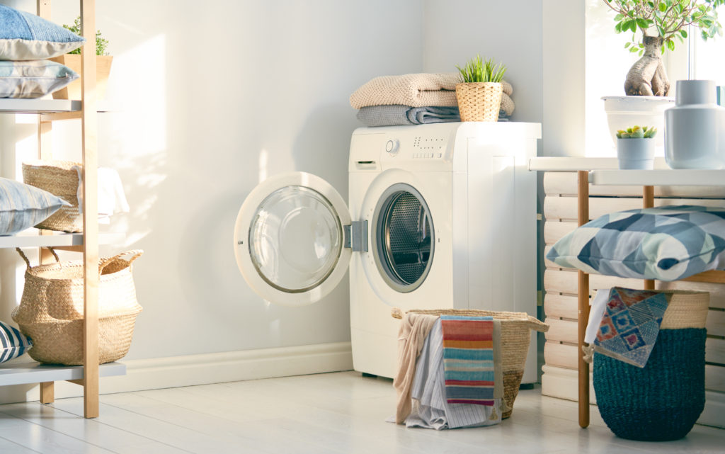 laundry room with a washing machine