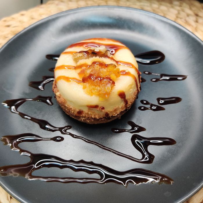 Catalan cream cake with nuts and citrus