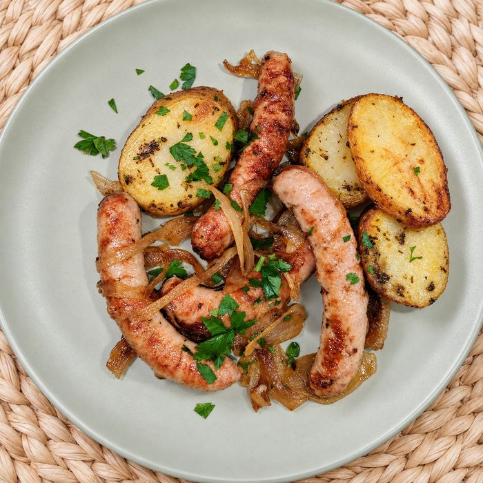 Salsitxes de porc amb ceba confitada 