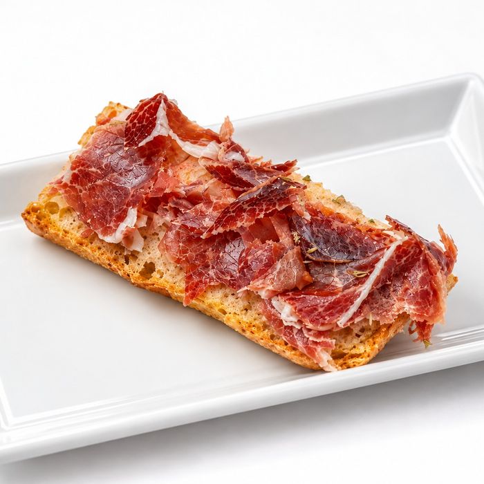 Pa de vidre amb pernil ibèric