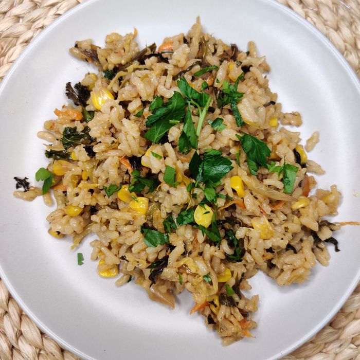 Rice, stir-fried with Chinese cabbage, owerro, corn, and soy