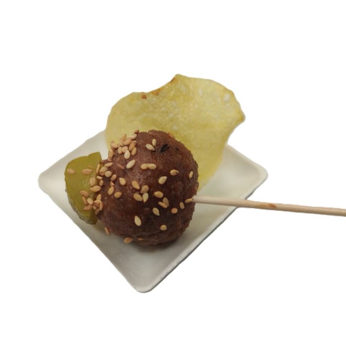 Meatball skewer with Teriyaki and sesame sauce