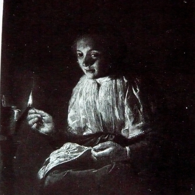 Woman sewing by lamplight by Judith Leyster