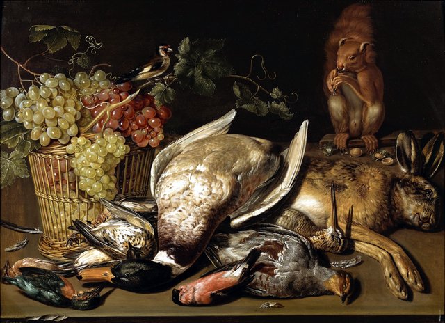Basket of red and green grapes with fruits of the hunt, including a goldfinch by Clara Peeters