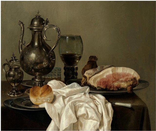 Still life with tazza, silver pot, roemer, glass of beer, four pewter plates with bread and ham on a green table cloth by Willem Claesz. Heda