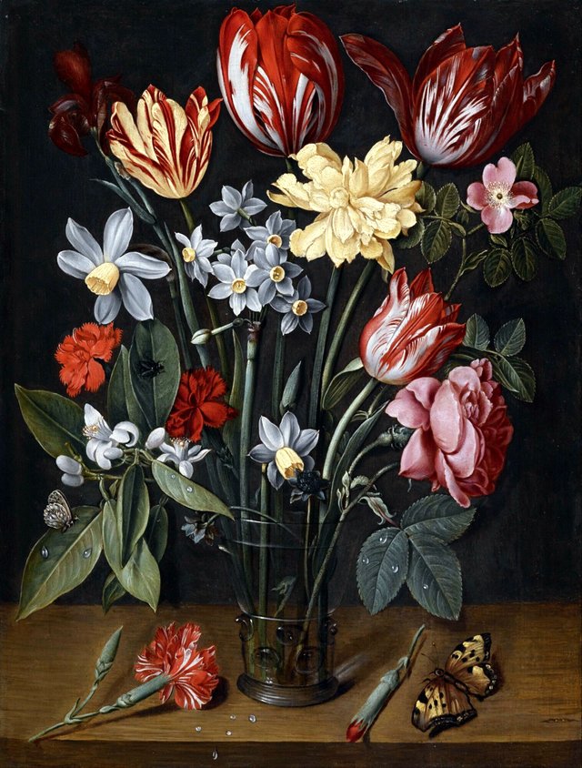 Still life with tulips, daffodils, carnations and other flowers in a vase, all resting on a wooden ledge with butterflies and a fly by Jacob van Hulsdonck