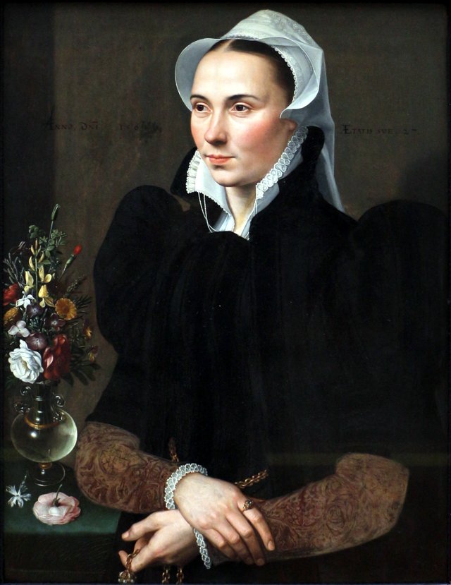 Portrait of a 27-year-old woman with a bunch of flowers by Adriaen Thomasz. Key